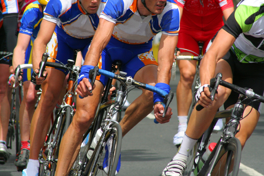 bikers riding on roadway